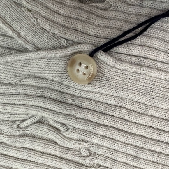 Lauris Long Sleeve Merino Wool Mini Sweater Dress
JACQUEMUS - Picture 16 of 16